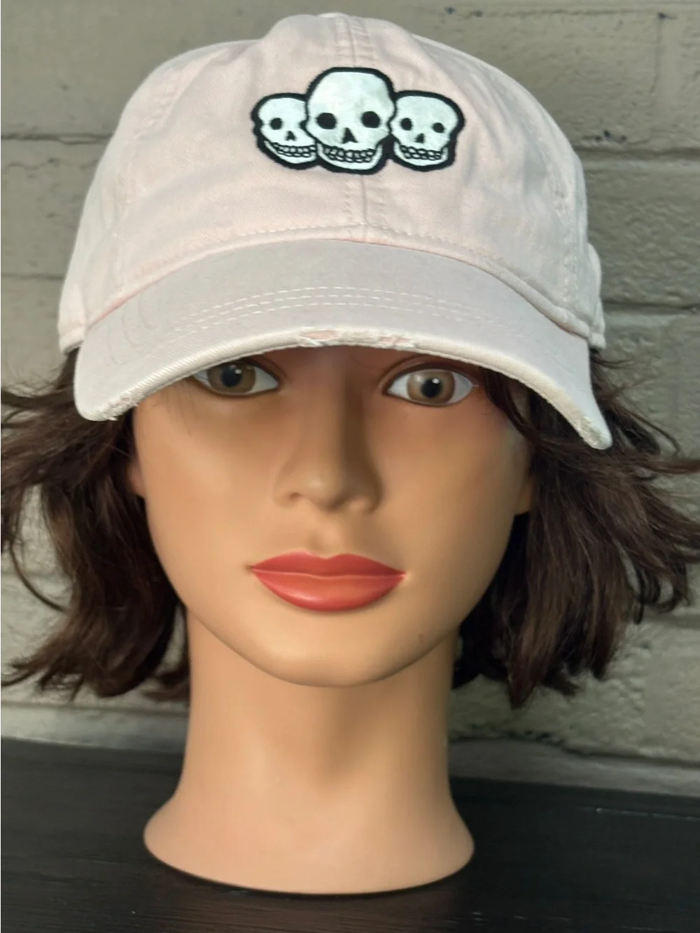 American Eagle Outfitters Light Pink Cap with triple skull patch